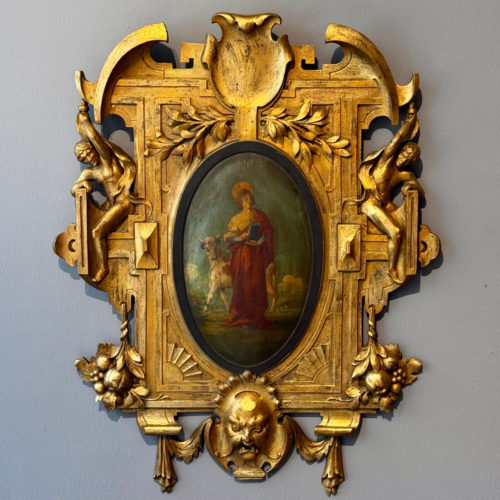 Panneau sculpté, doré et polychrome hommage à Saint Luc.